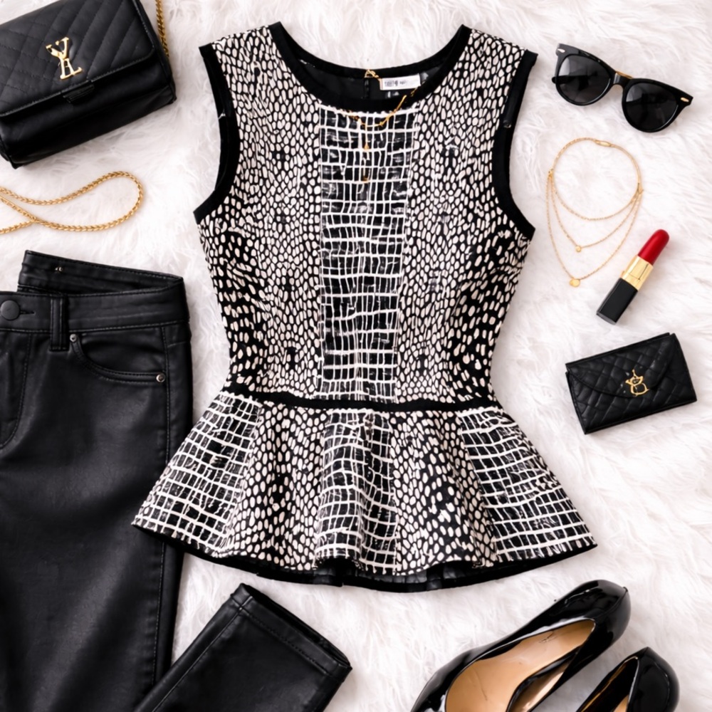 Elegant Black and White Patterned Peplum Top